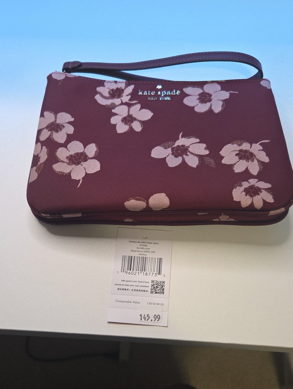 kate spade Burgundy Floral Wristlet with Pink Blossoms